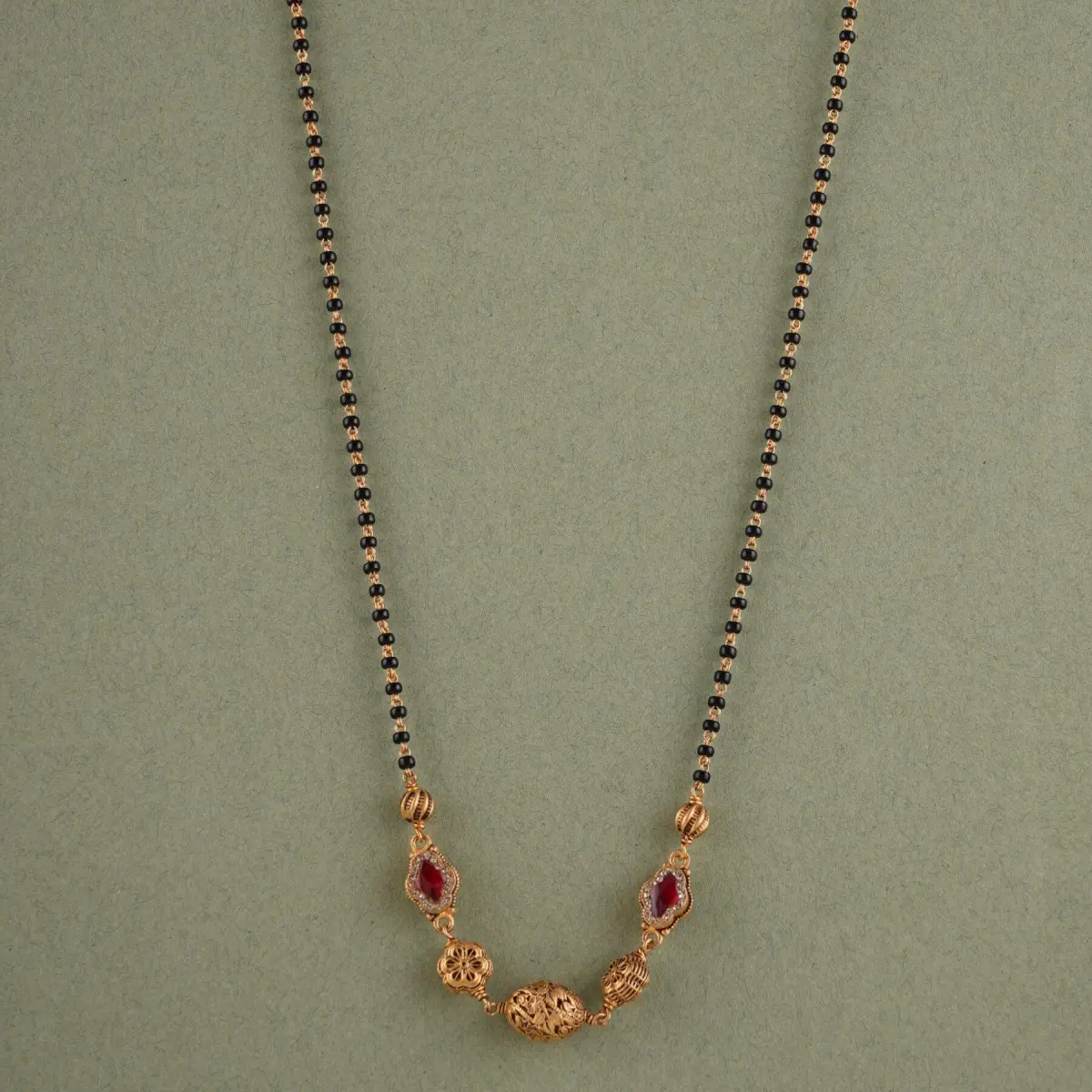 Beautiful Gold Small Mangalsutra for Ladies with Beautiful Design & Red Stone 