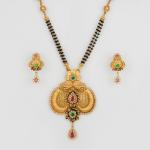 Gold Antique Mangal Sutra pendant Set for Ladies with beautiful Earrings and Kundan Stones 