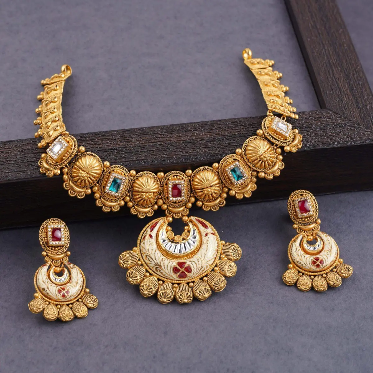 Adoreable Gold Necklace Set in Antique Design with Beautiful Meena work & Stones 