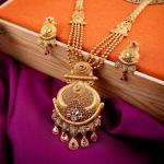 Gold Long Antique Ranihar Set in Drop Shape with Leaf Design & Beautiful Kundan Stone 