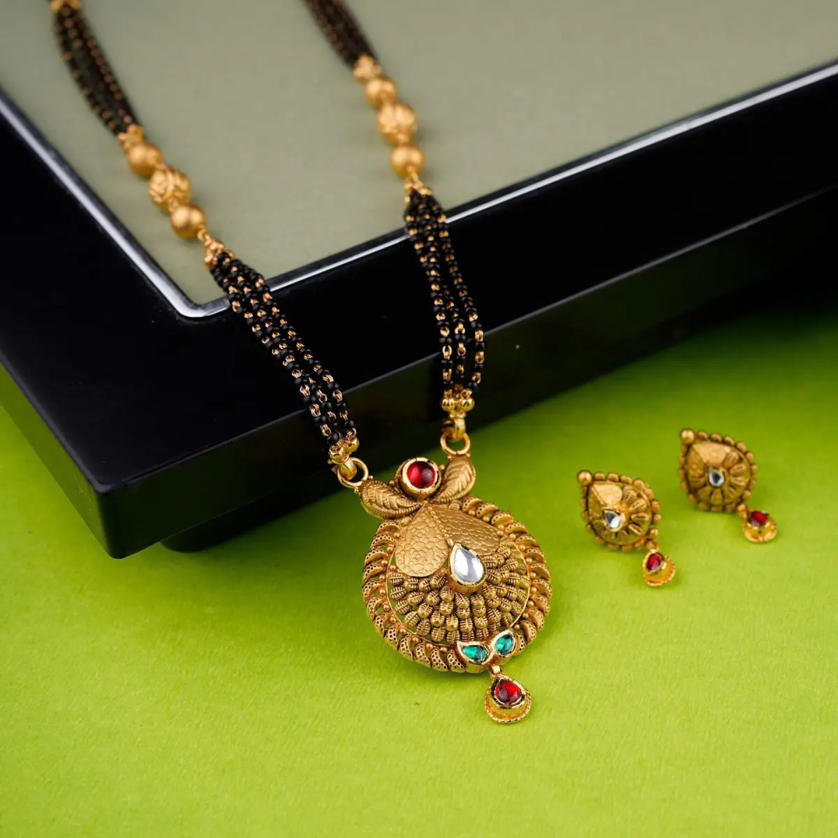 Amazing Gold Mangal Sutra Pendant Set with Earrings in Beautiful design for Ladies 