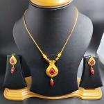 22 Karat Yellow Gold Kitty Set with Red Pearl