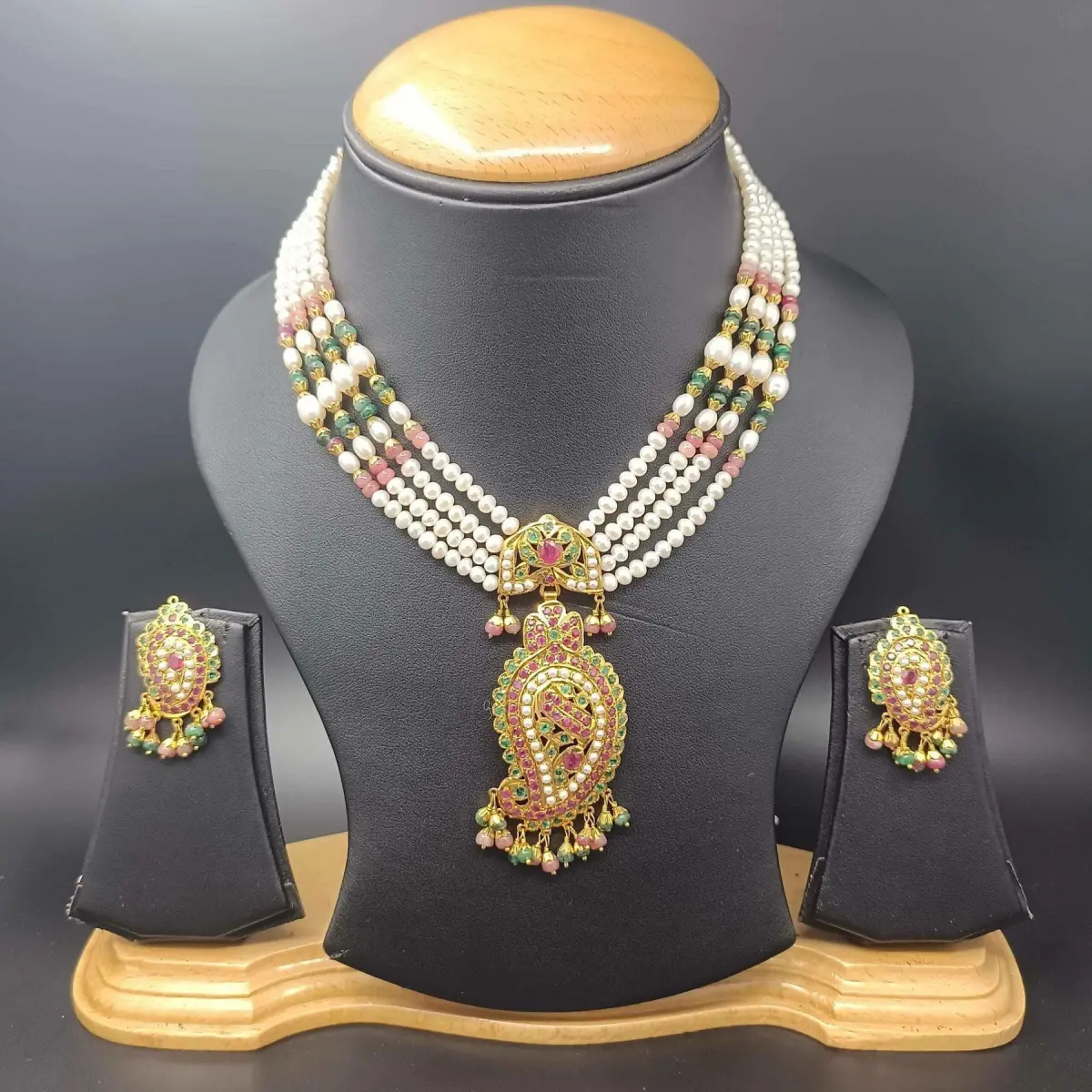 Gold Set Studded with Real Ruby Emeralds and Moti