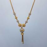 Designer Gold Chain With Attached Pendent